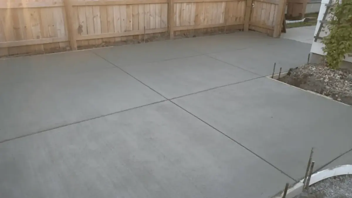 Concrete driveway and back patio behind a home in South Buffalo NY — Cornerstone Concrete of WNY